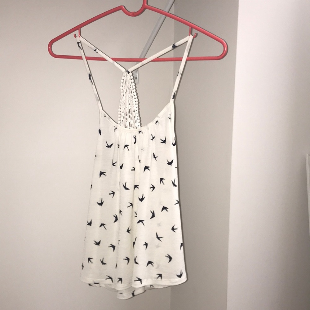 A white spaghetti strap tank top